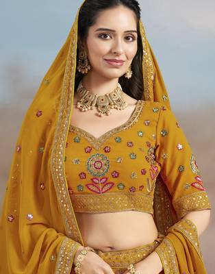 YELLOW GEORGETTE SEQUINS THREAD ZARI EMBROIDERED LEHENGA CHOLI 3