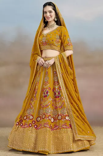 YELLOW GEORGETTE SEQUINS THREAD ZARI EMBROIDERED LEHENGA CHOLI