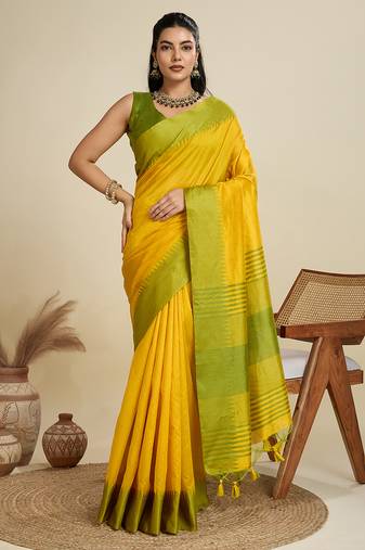 Yellow silk blend saree with temple border and contemporary striped pallu