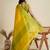 Yellow silk blend saree with temple border and contemporary striped pallu