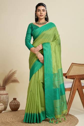 Light green silk blend saree with temple border and striped pallu