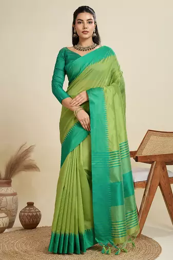 Light green silk blend saree with temple border and striped pallu