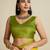 Yellow silk blend saree with temple border and contemporary striped pallu