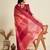 Peach  temple design silk blend saree with striped pallu and blouse
