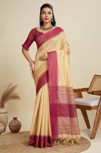 Beige silk blend saree with contrast red temple border
