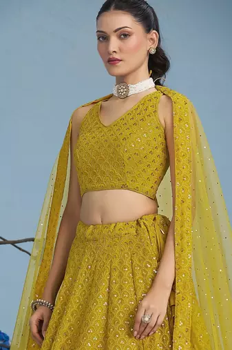 YELLOW GEORGETTE SEQUINS THREAD EMBROIDERED LEHENGA CHOLI