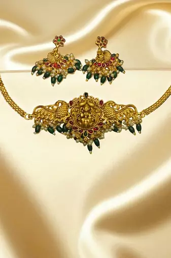 Golden glamourantique temple peacock jewelry set – gold-toned with pearl & green beads