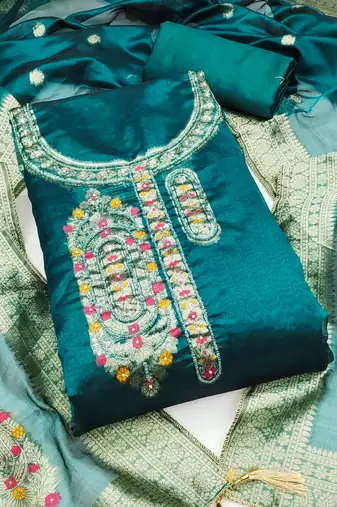 Women's teal handwork dress material