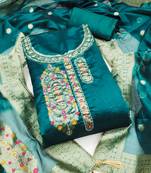 Women's teal handwork dress material