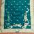 Women's teal handwork dress material