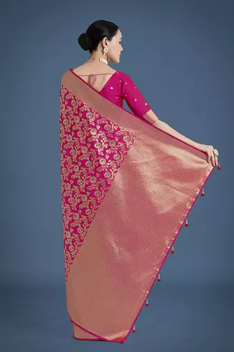 Banarasi silk blend rani pink zaal pattern with zari weaving work saree