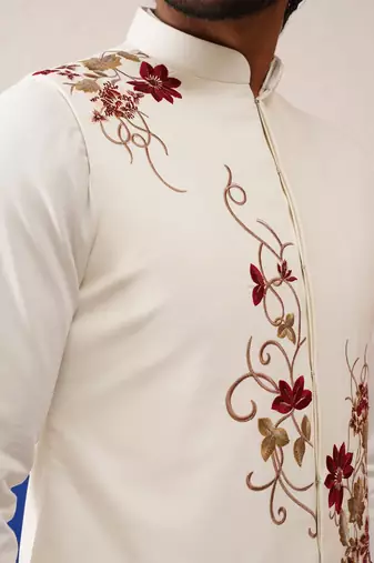 Tanzeel khan in white cotton embroidered jacket kurta set