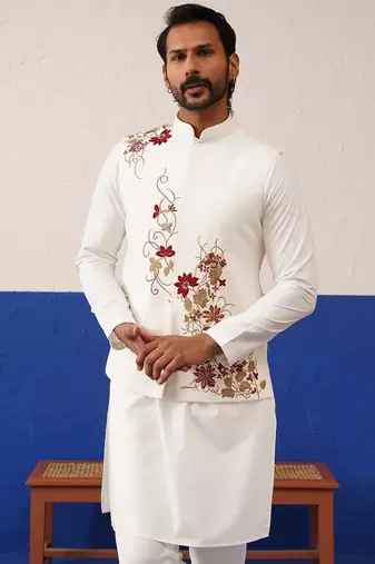 Tanzeel khan in white cotton embroidered jacket kurta set