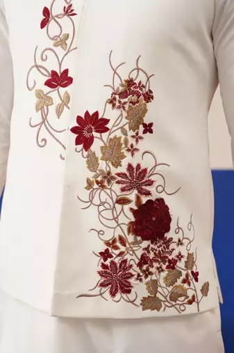 Tanzeel khan in white cotton embroidered jacket kurta set