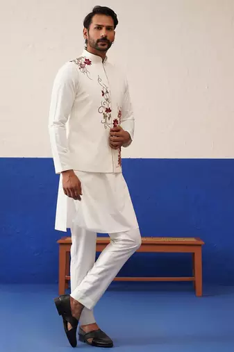 Tanzeel khan in white cotton embroidered jacket kurta set
