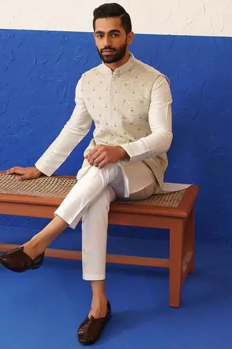 Cream colour velvet with self texture bundi set
