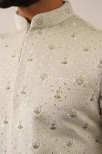 Cream colour velvet with self texture bundi set