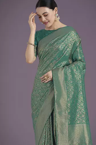 Teal color baanrasi satin silk blend zari woven saree