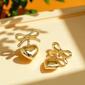 Gg golden glamour heart bow statement earrings – anti tarnish finish 1