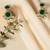 Golden glamour emerald drop antique earrings for women – traditional oxidized silver with green stone & pearl danglers