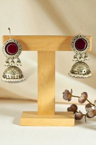 Golden glamour antique jhumka earrings with green stone & pearl detailing