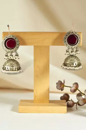 Golden glamour antique jhumka earrings with green stone & pearl detailing