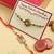 Traditional Rakhi Hamper Set with Peacock & Ganesh Design