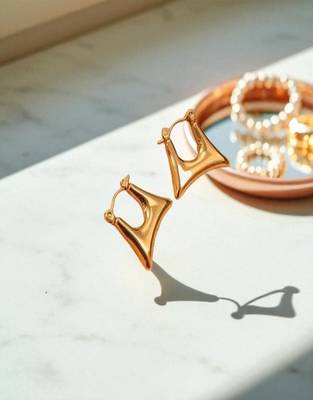 Golden glamouranti tarnish sleek triangle hoop earrings 3