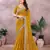 Dark yellow embroidered georgette saree  