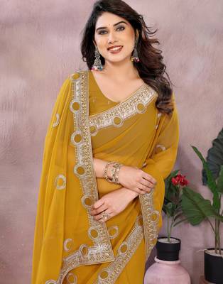 Dark yellow embroidered georgette saree   4