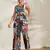Multi-color printed waist cut-out jumpsuit