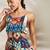 Multi-color printed waist cut-out jumpsuit