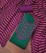 Women's dark green embroidered dress material