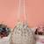 Ivory Lume Mirror Embellished Potli Bag – Golden Grace (9 x 8.5 in)