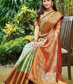 green soft silk blend kanjeevaram zari work saree with blouse piece