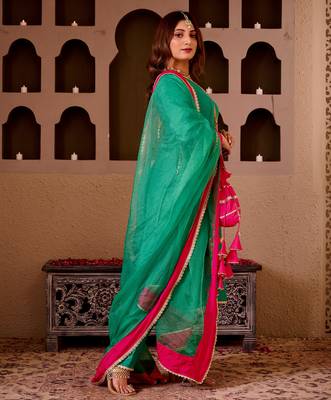 Suruchi emerald green silk hand embroidered suit set 1