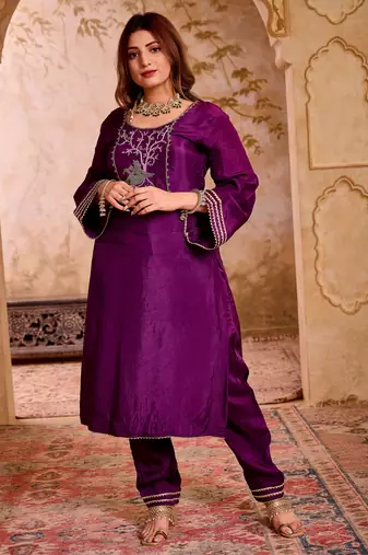 Krishika purple silk vrindavan themed hand embroidered suit set