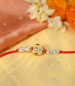 Teardrop stone green rakhi with enamel design and pearl beads