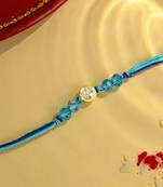 Blue thread rakhi with gold-framed stone and crystal beads