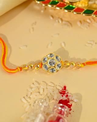 Yellow thread rakhi with floral stone motif and crystal beads 3