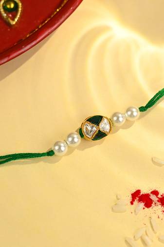 Green thread rakhi with dual stone oval charm and pearl beads