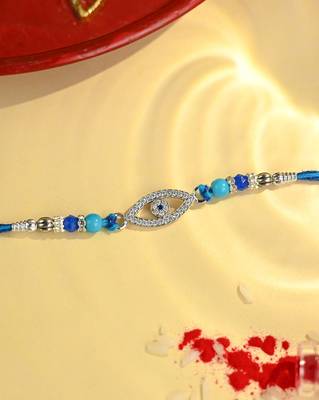 Blue thread evil eye rakhi with sparkling stones and beads 1