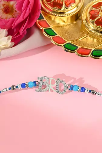 Blue thread bro letter rakhi with sparkling stones and beads