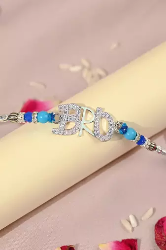 Blue thread bro letter rakhi with sparkling stones and beads