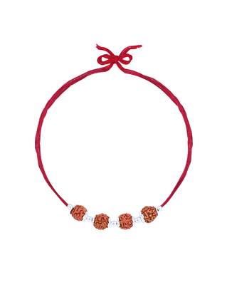 Red thread rakhi with four rudraksha beads and silver detailing 2
