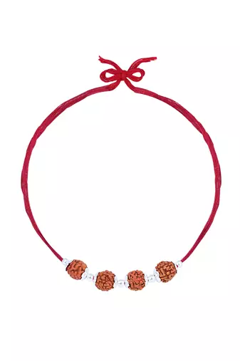 Red thread rakhi with four rudraksha beads and silver detailing