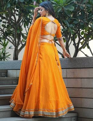 Amazing Orange Laheriya Print Georgette Haldi Wear Lehenga Choli 4
