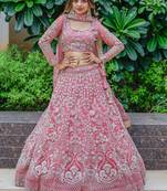 Beautiful Pink Dori Work Soft Net Ceremony Wear Lehenga Choli