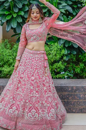 Beautiful Pink Dori Work Soft Net Ceremony Wear Lehenga Choli