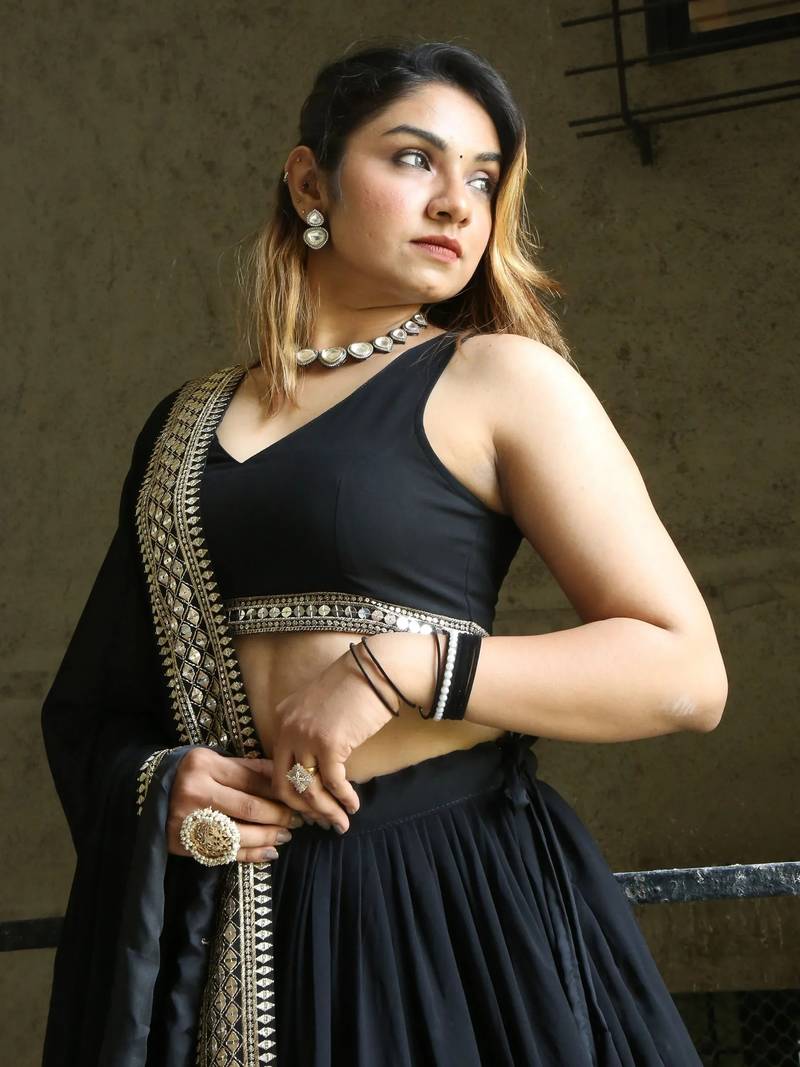 Pretty Black Heavy Lace Work Georgette Reception Wear Lehenga Choli